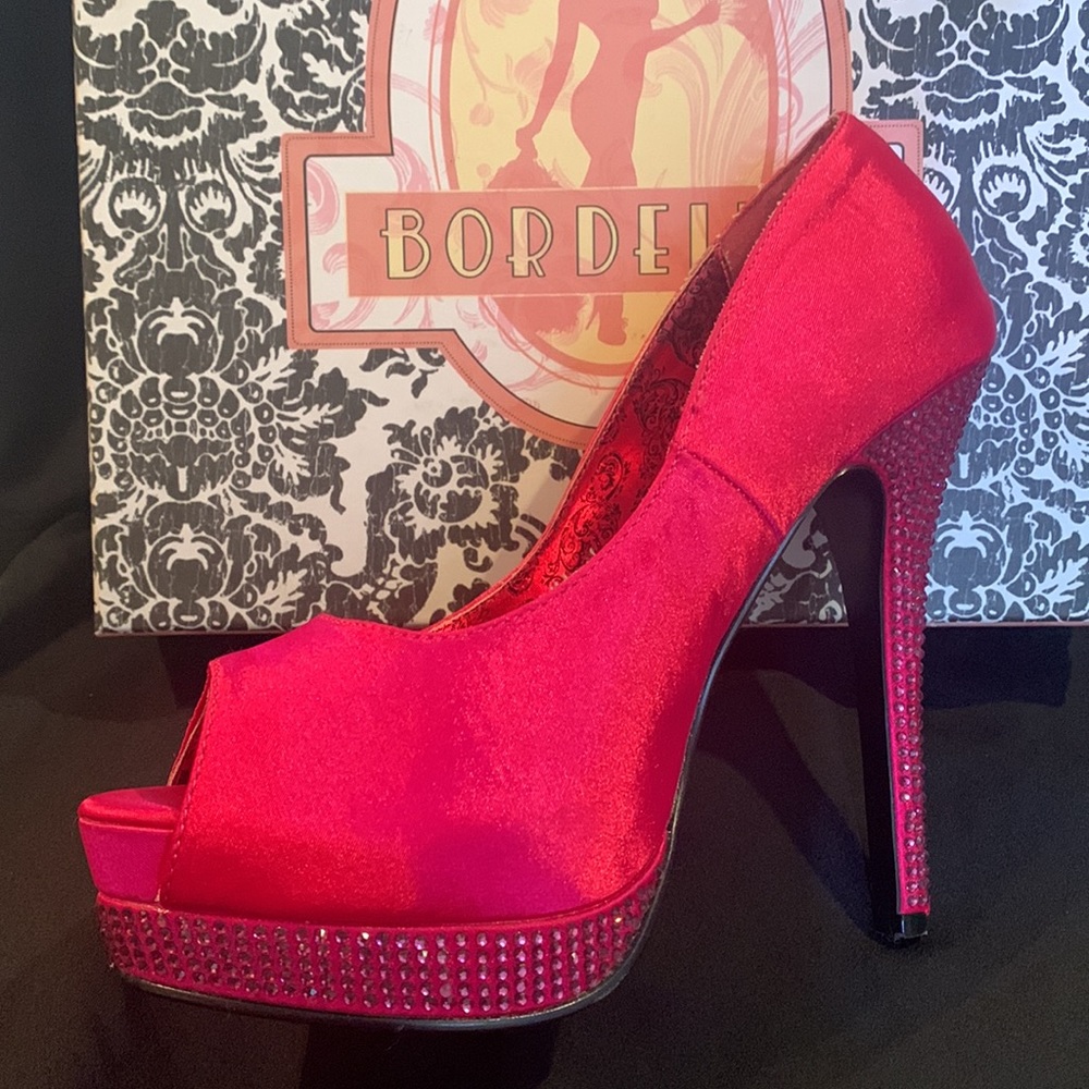 Bordello satin peep toe pumps.